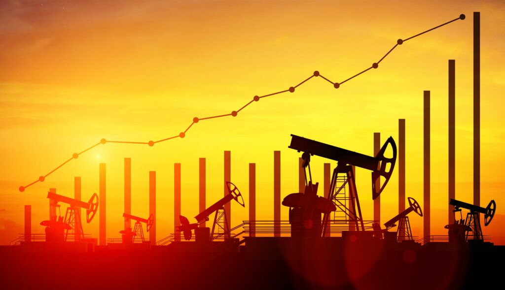 oil pump jacks on sunset sky background