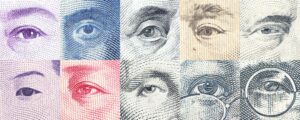 eyes of famous leader on banknotes, currencies of the global economies - compressed